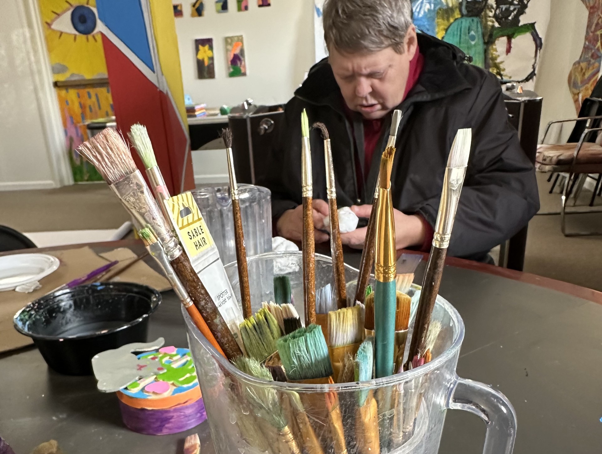 man making art